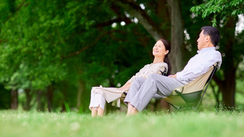 Person wearing soft muscle-relaxing clothing for daily comfort and recovery